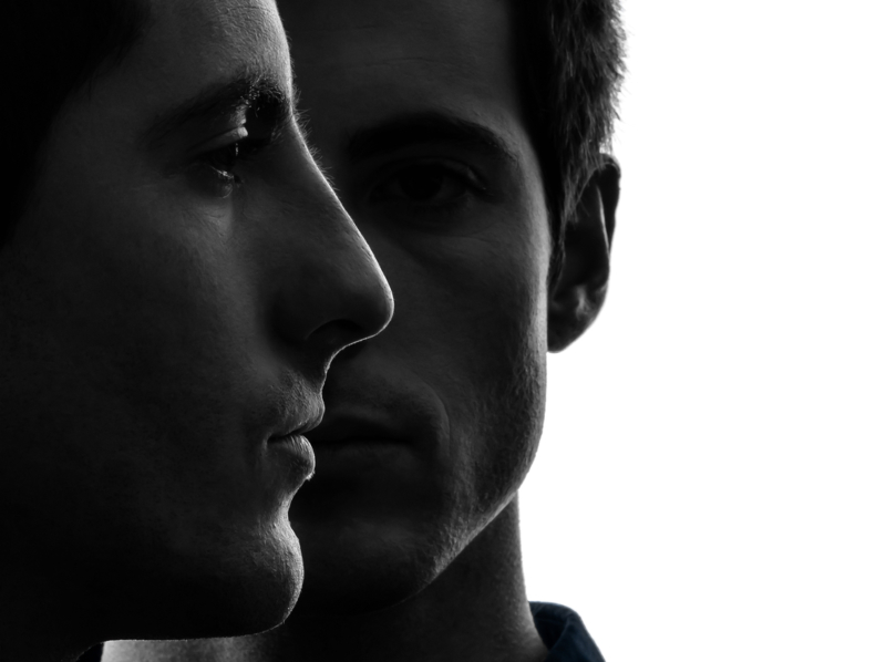 Close,Up,Portrait,Two,Caucasian,Young,Men,In,Shadow,White