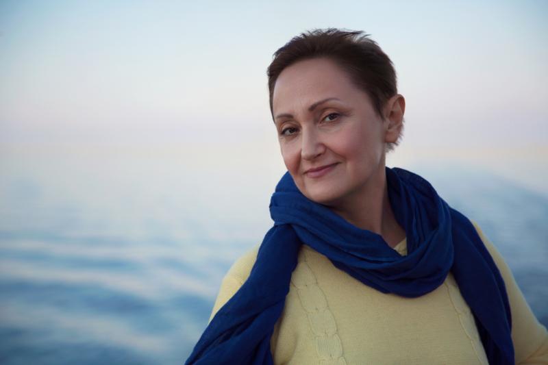 Portrait,Of,Happy,Older,Woman,Cruising,On,A,Cruise,Ship